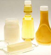 adding oil and butter to baby food