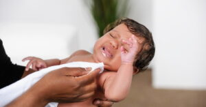 Read more about the article My 5-Month-Old Baby Throws Up When Pooping: Is it Acid Reflux?