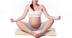 Read more about the article Helpful Pregnancy Yoga Tips & Benefits For Each Trimester