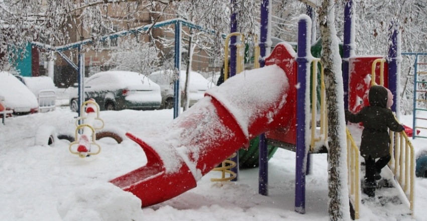 visit playground in the snow